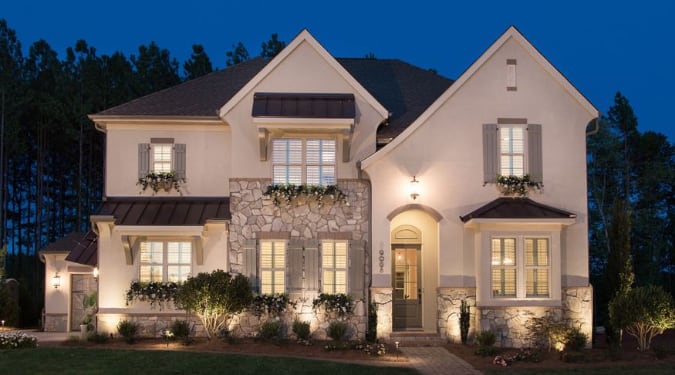 Home exterior with plantation shutters